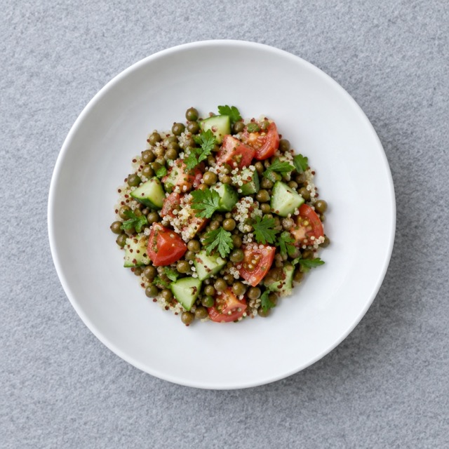 Tofu scramble with spinach on a white plate, a simple plant-based high protein vegan breakfast